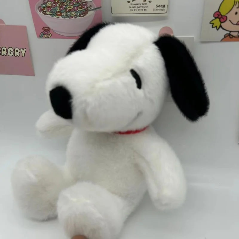 Peluche perrito blanco de 25 cm, vista de perfil